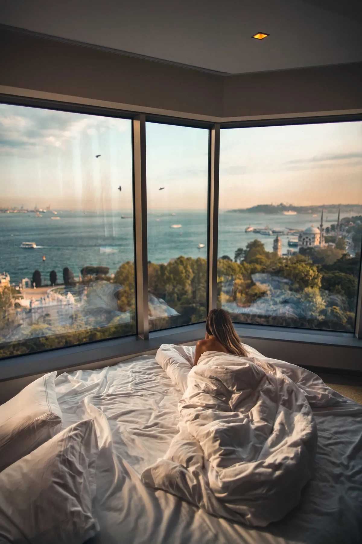 A hotel pool terrace at golden hour